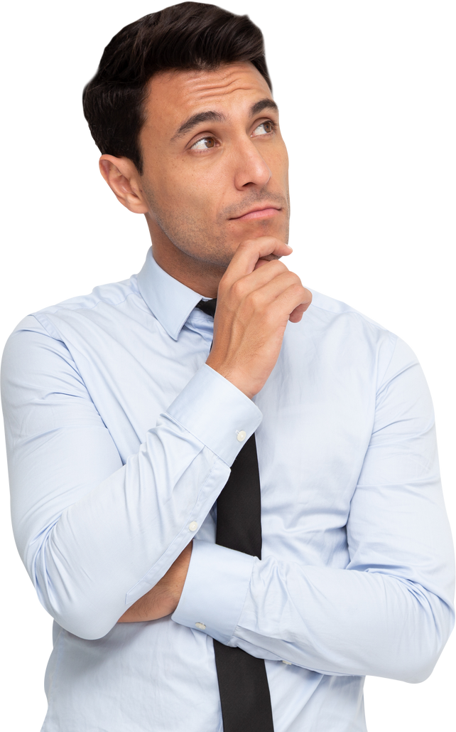 Young businessman thinking and looking aside